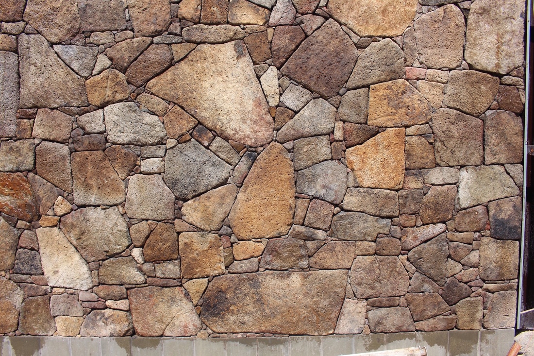 Structural rock walls